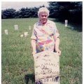 Etta Tramel Brown at grave of great grandfather, Wm H. Tramel