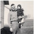 Emerson Jones holding son, Bill Jones