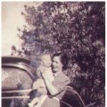 Hilda Hern Paxton, wife of Merton William Bailiff, holding sisters child, 1939