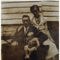 Paul Bailiff holding daughter, Paulette Bailiff, with wife, Jessie Vandergriff Bailiff