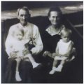 James Rodney "Dunk" Cook and wife, Sarah Juliana Milstead Cook holding granddaughters, Oleda Cook and Sarah Jodean Cook