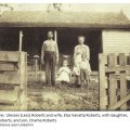 Ulesses (Less) Roberts and wife, Elza Vanatta Roberts, with daughter, Vaughtie Roberts, and son, Charlie Roberts