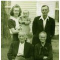 James Rodney "Dunk" Cook, Sarah Milstead Cook, Alma Cook Martin holding Judy Martin, and Shelah Cook