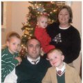 Andrew Moberly and wife, Holly Stanley Moberly, with children, Jacob Moberly, Carter Moberly, and Rachel Moberly