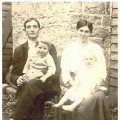 Lafayette Mullican and wife, Martha Cripps Mullican, holding their children, Alvie Mullican and Hoiet Mullican